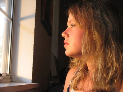 girl looking out window
